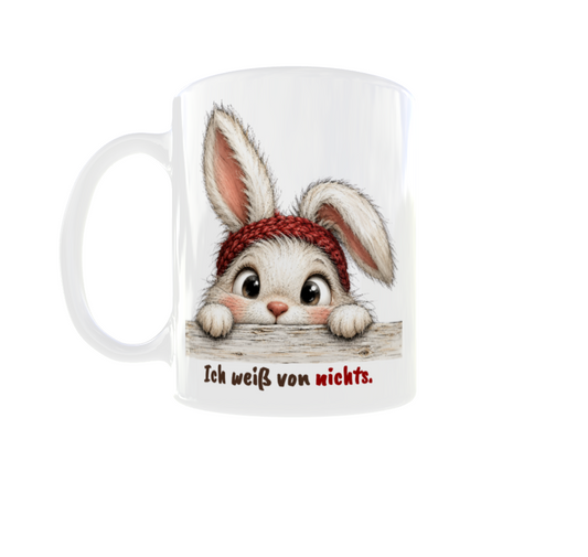 Weiße Tasse mit niedlichem Hasen, rotem Strickstirnband und Spruch „Ich weiß von nichts.“